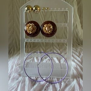 1 big brown rose button clip on, 2 gold tone post , 1 large metal purple hoop